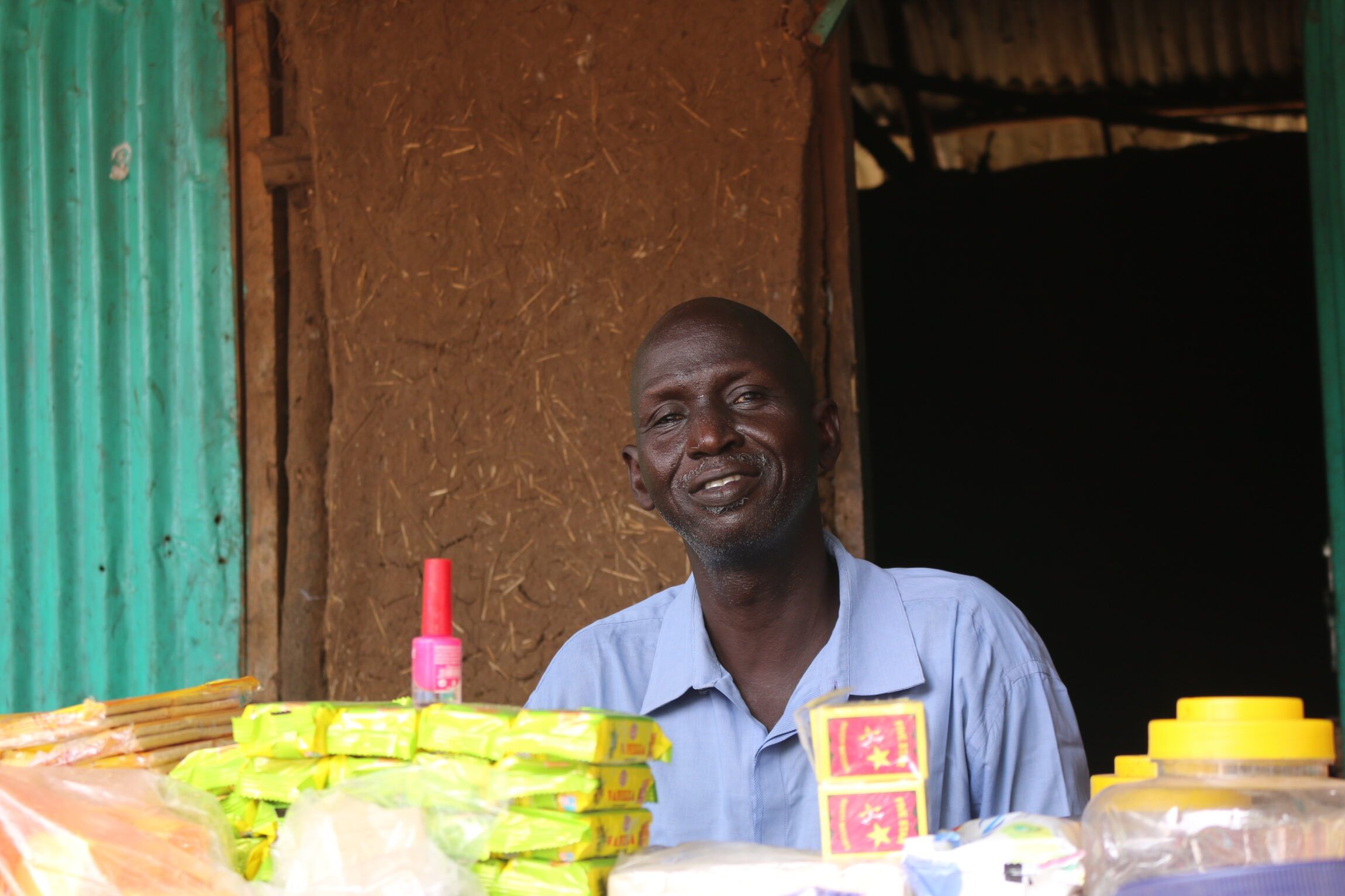 Makal Yian Kalang has a convinience shop and he is supported by DCA's Small Business Development intervention.