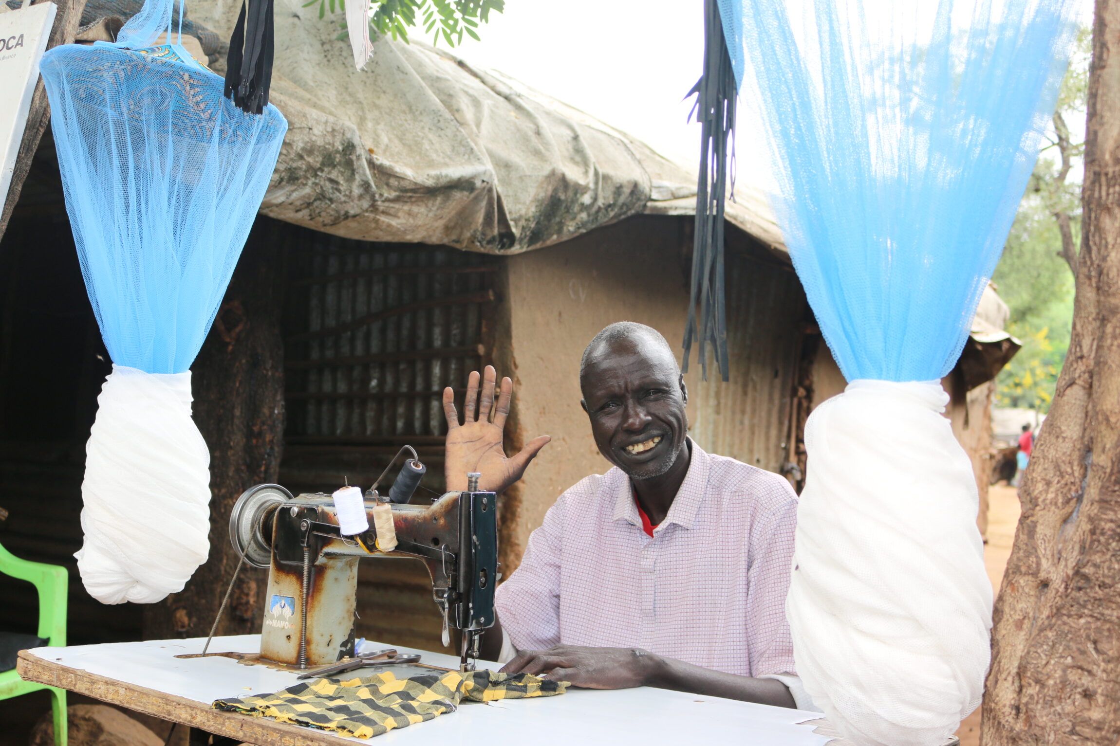 Gatbel Thach has tailoring business and he is supported by DCA's Small Business Development intervention.