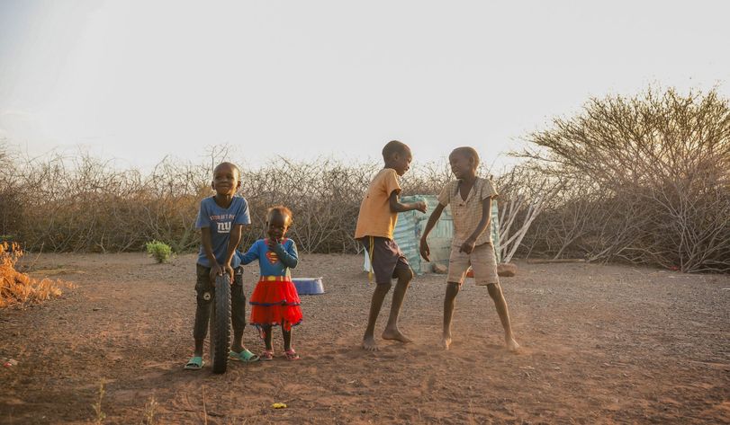 Four children playing together.