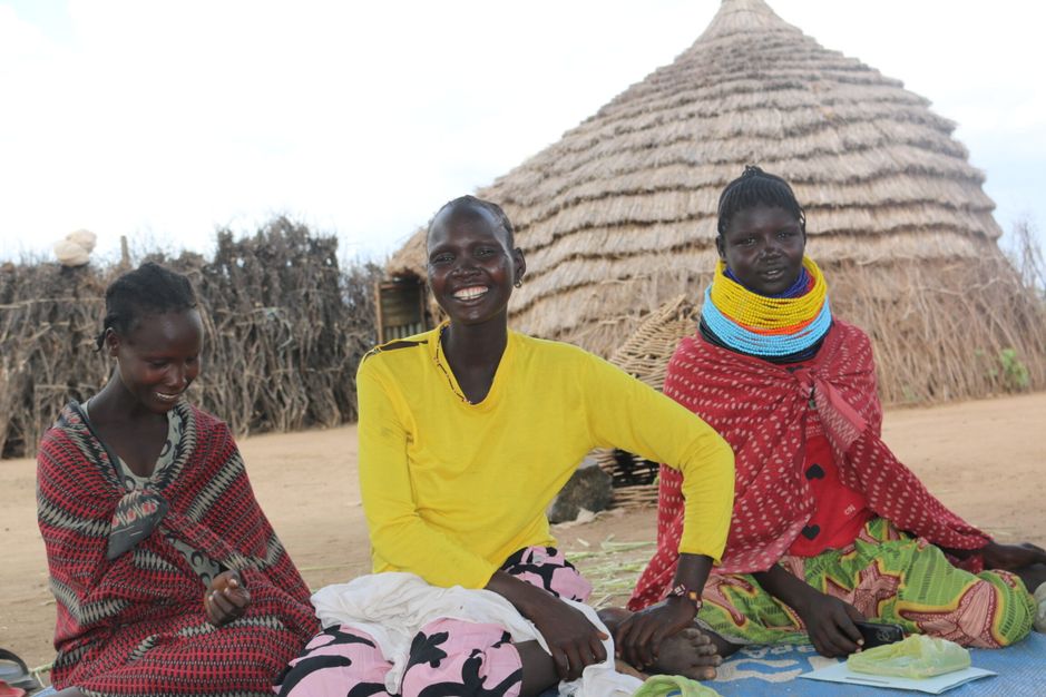 Nakale Loynach [Captured In the middle], the leader of the Ala Kara Village Savings and Loan Association (VSLA)