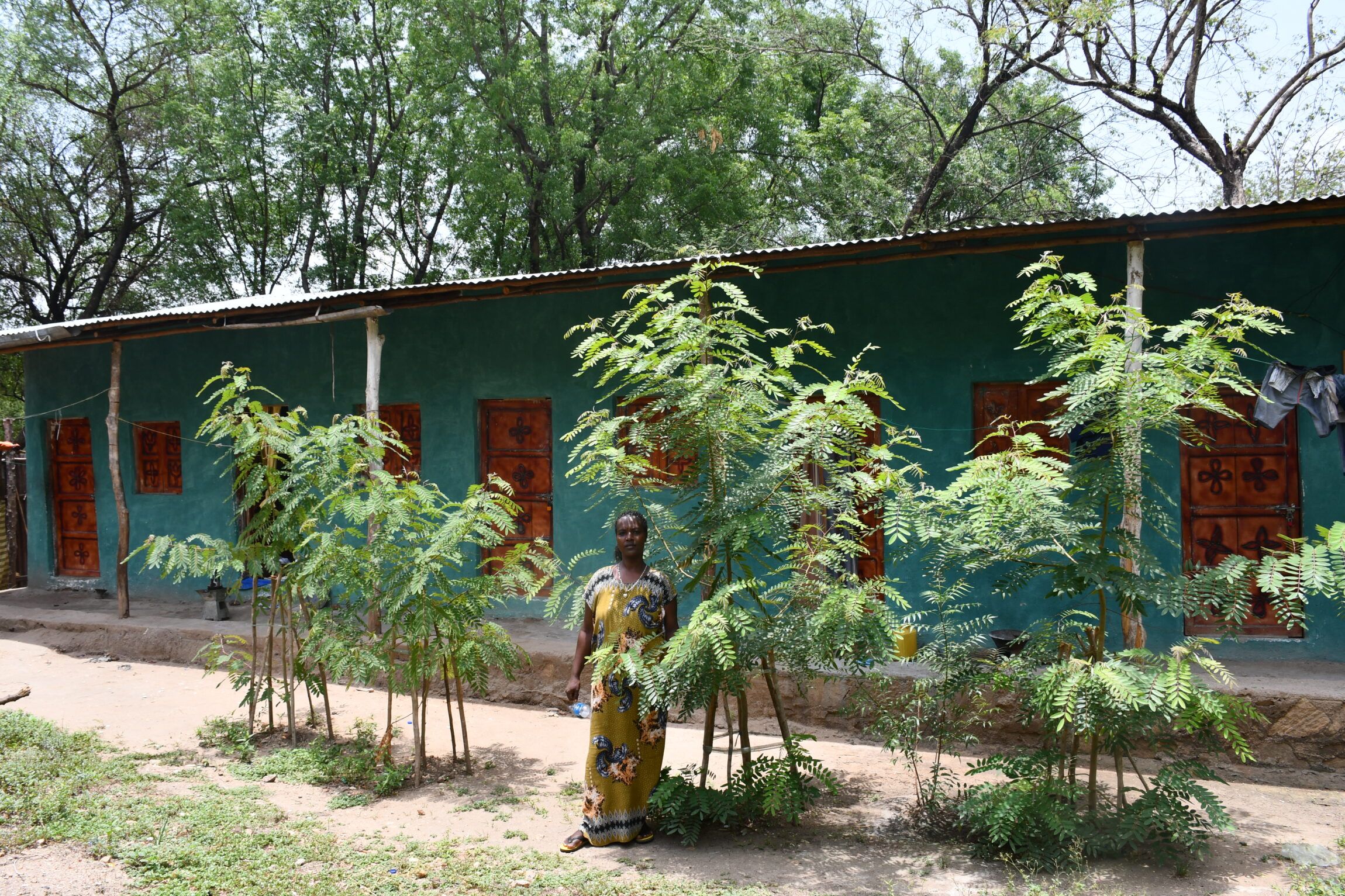 The financial security she achieved through her farm has allowed Fathia to invest in a six-room house, generating a monthly rental income.
